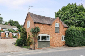 Quaint Victorian Coach House in village location
